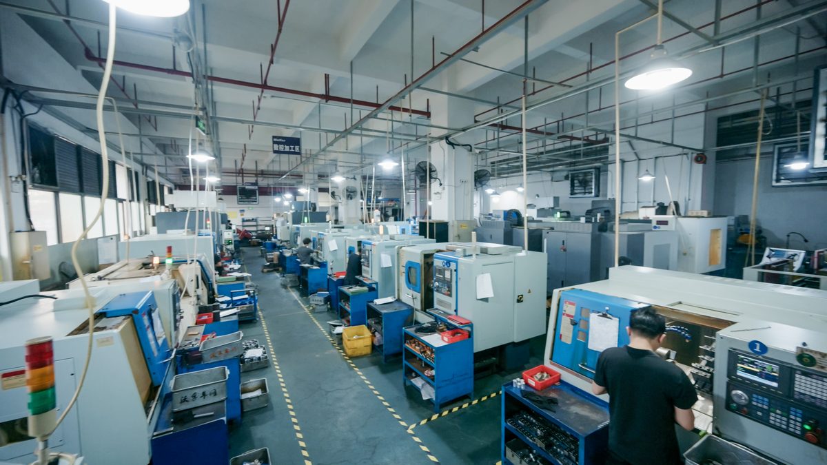 Panoramic view of Wolfer's Foshan CNC machining workshop with rows of precision equipment